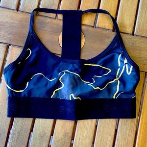 Noll Sports Bra in Black & Gold. NWOT.